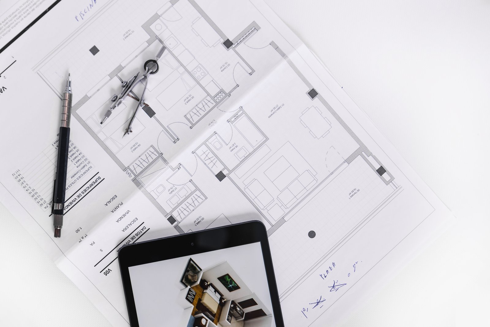 Planning drawings and blueprints on a studio desk — architectural drawings in Barnet